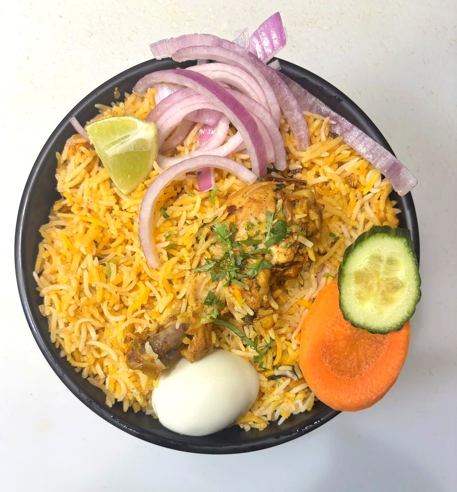 Biryani de poulet dum Hyderabad — plat signature Bawarchi